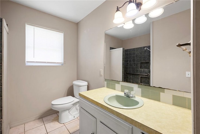 806 W 3rd St, Russellville, AR 72801 - bathroom featuring decorative backsplash, toilet, tile patterned flooring, vanity, and baseboards
