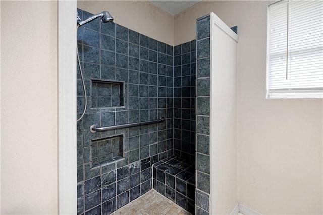 806 W 3rd St, Russellville, AR 72801 - bathroom featuring tiled shower and baseboards