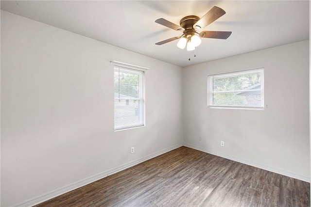 806 W 3rd St, Russellville, AR 72801 - unfurnished room with wood finished floors, baseboards, and a ceiling fan