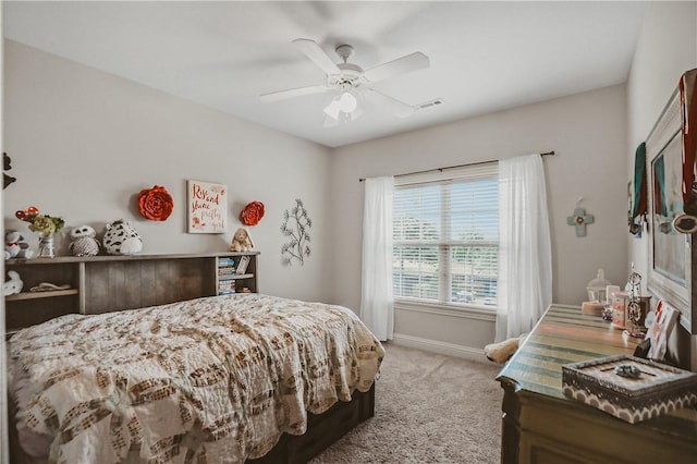 11136 W Stonebriar Dr, Bentonville, AR 72712 - bedroom with light carpet, baseboards, and a ceiling fan