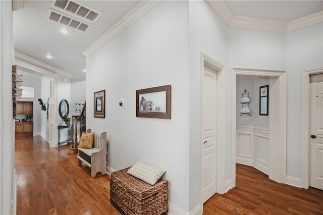 11136 W Stonebriar Dr, Bentonville, AR 72712 - corridor featuring crown molding, wood finished floors, recessed lighting, and a wainscoted wall