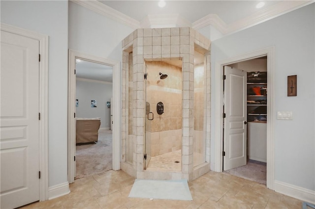 11136 W Stonebriar Dr, Bentonville, AR 72712 - full bath featuring crown molding, a shower stall, baseboards, and a walk in closet