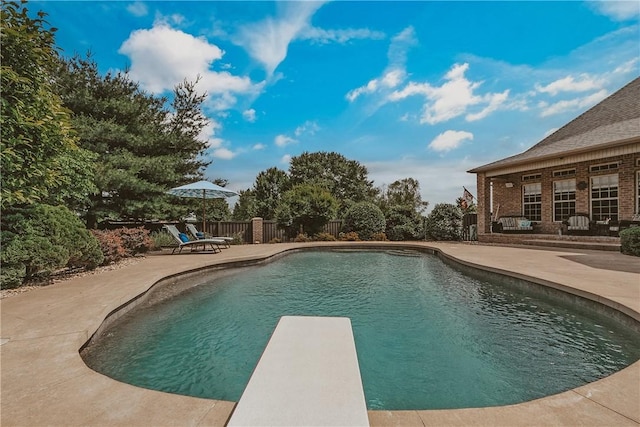11136 W Stonebriar Dr, Bentonville, AR 72712 - view of swimming pool with a patio and a diving board