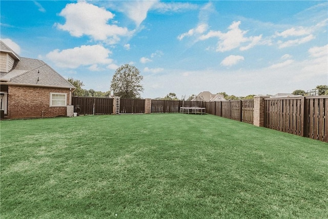 11136 W Stonebriar Dr, Bentonville, AR 72712 - view of yard featuring a trampoline