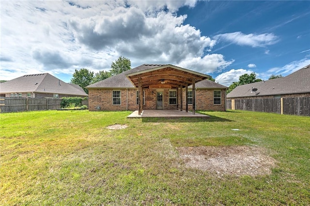 3658 W Mountain View Dr, Fayetteville, AR 72704 - back of property featuring a patio area and brick siding