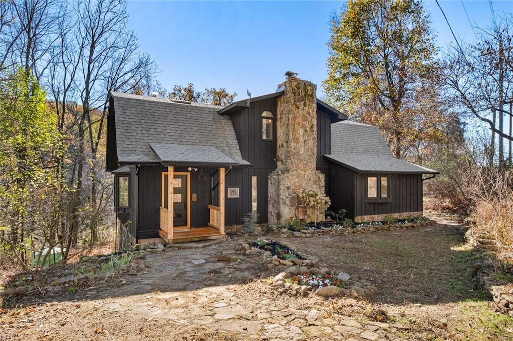 4367 Cr-705, Green Forest, AR 72638 - view of front of property with a shingled roof and a chimney