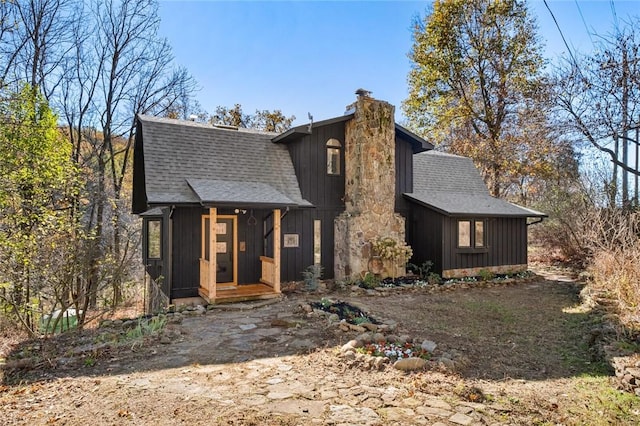 4367 Cr-705, Green Forest, AR 72638 - view of front of property with a shingled roof and a chimney