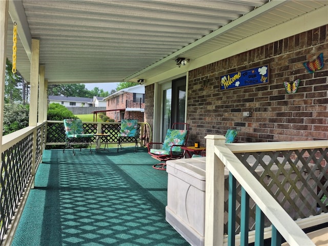 wooden deck with a porch
