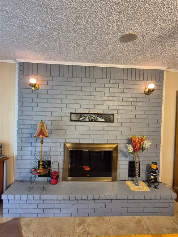 detailed view of crown molding, a textured ceiling, and a fireplace