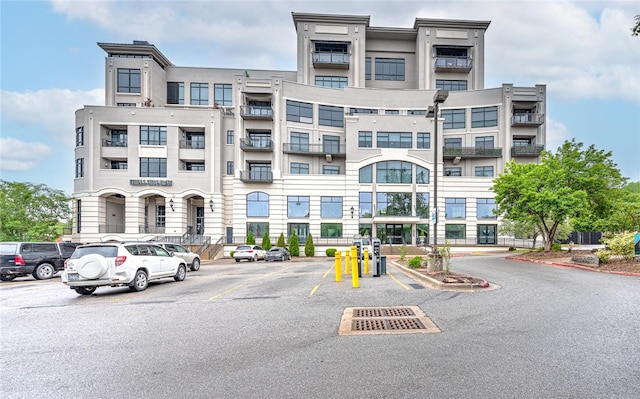 401 W Watson St Unit 408, Fayetteville, AR 72701 - view of building exterior featuring uncovered parking