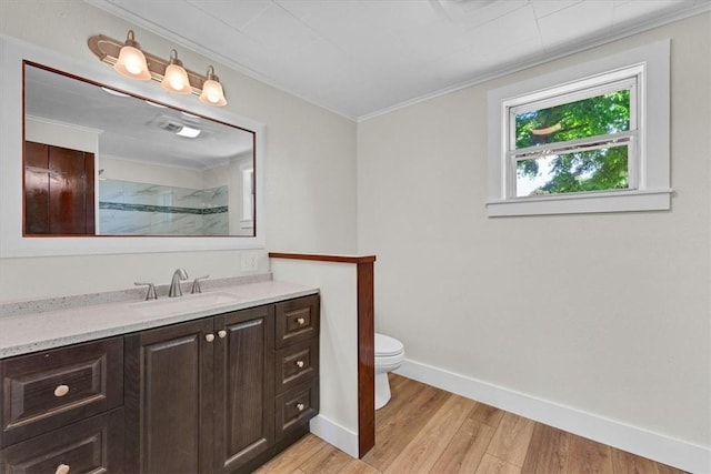 21106 Kirksey Rd, Elkins, AR 72727 - full bath featuring wood finished floors, crown molding, toilet, vanity, and a shower