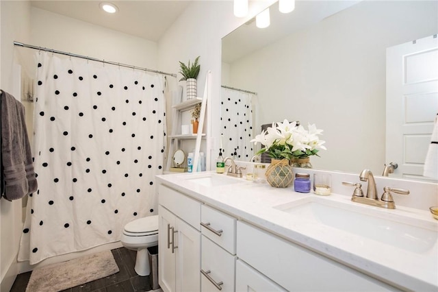 bathroom with toilet, double vanity, recessed lighting, and shower / tub combo with curtain