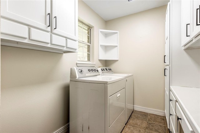 655 Bloomfield St, Gentry, AR 72734 - laundry room featuring cabinet space, independent washer and dryer, and baseboards