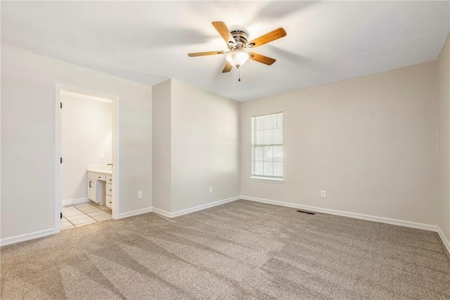 655 Bloomfield St, Gentry, AR 72734 - unfurnished room featuring light colored carpet, ceiling fan, and baseboards