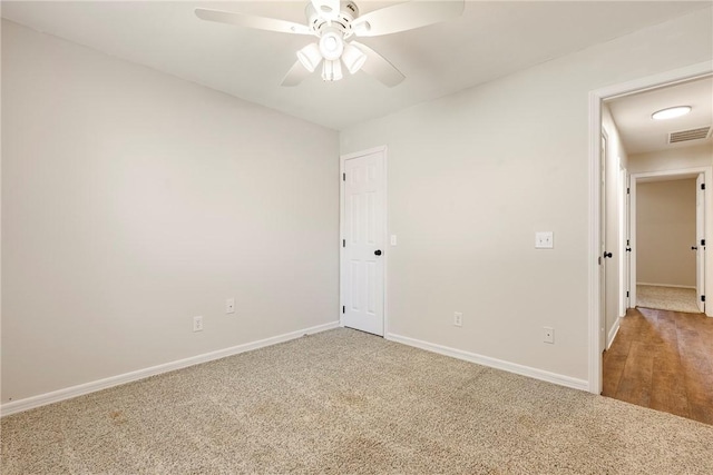 655 Bloomfield St, Gentry, AR 72734 - carpeted empty room featuring baseboards and ceiling fan