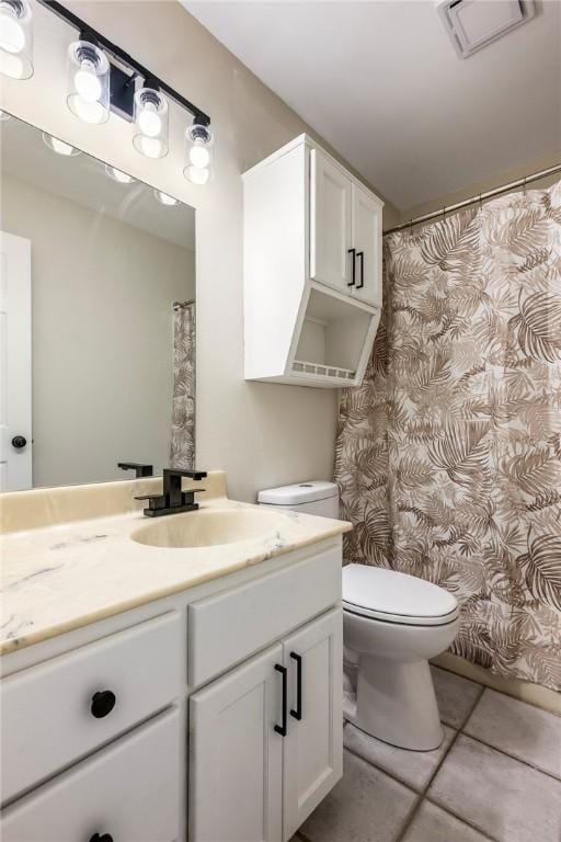 655 Bloomfield St, Gentry, AR 72734 - bathroom with toilet, vanity, and tile patterned flooring