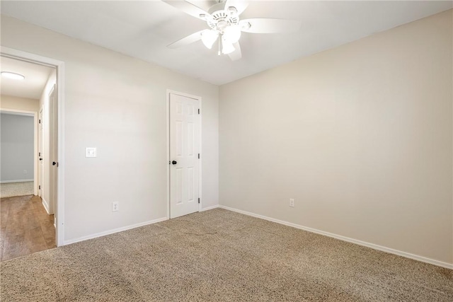 655 Bloomfield St, Gentry, AR 72734 - unfurnished bedroom with carpet floors, baseboards, and ceiling fan