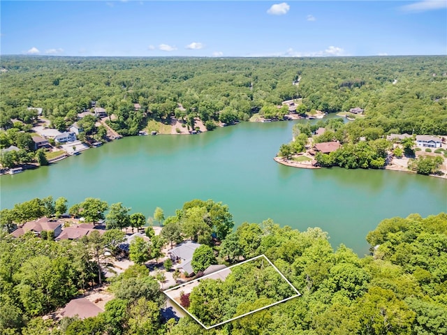 10 Forfar Cir, Bella Vista, AR 72715 - aerial view of property's location featuring a forest, property parcel outlined, and a nearby body of water