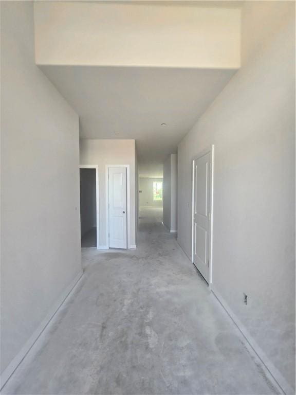 2308 Lexington St, Siloam Springs, AR 72761 - spare room featuring baseboards and unfinished concrete flooring