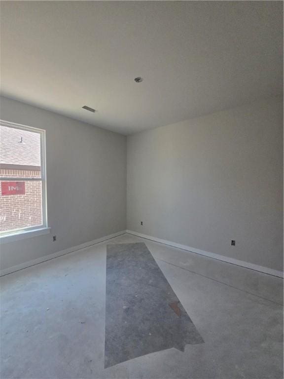 2308 Lexington St, Siloam Springs, AR 72761 - unfurnished room featuring concrete flooring and baseboards