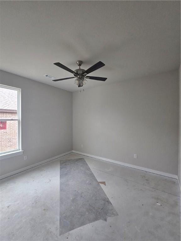 2308 Lexington St, Siloam Springs, AR 72761 - unfurnished room with unfinished concrete flooring and ceiling fan