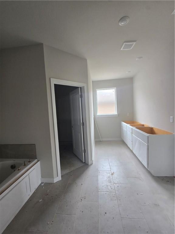 2308 Lexington St, Siloam Springs, AR 72761 - full bathroom with a bath and baseboards