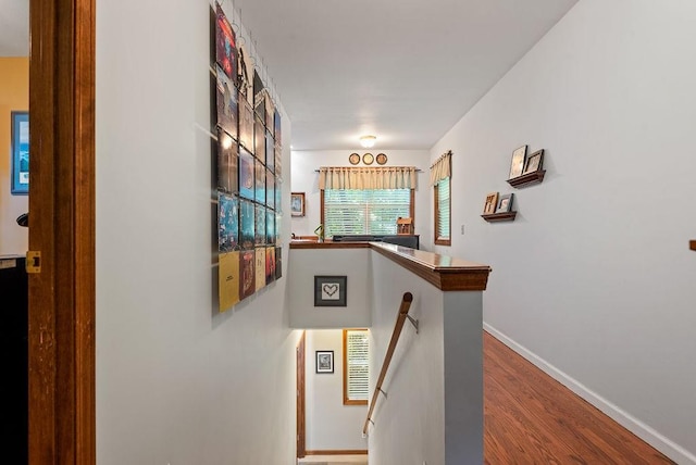 35 Kingshighway, Eureka Springs, AR 72632 - corridor featuring wood finished floors, baseboards, and an upstairs landing