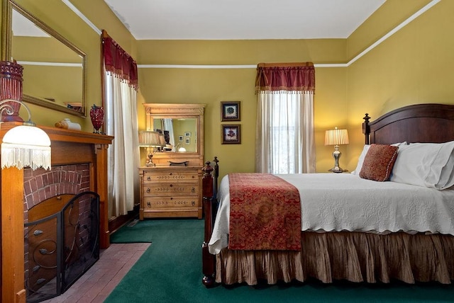 35 Kingshighway, Eureka Springs, AR 72632 - bedroom featuring dark carpet and a brick fireplace