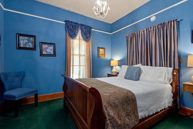 35 Kingshighway, Eureka Springs, AR 72632 - bedroom featuring carpet flooring, baseboards, and a chandelier