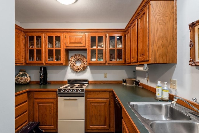 35 Kingshighway, Eureka Springs, AR 72632 - kitchen with white electric range, a sink, black dishwasher, and brown cabinets