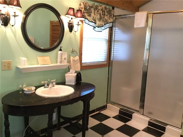 35 Kingshighway, Eureka Springs, AR 72632 - full bathroom featuring a sink, a stall shower, and tile patterned floors