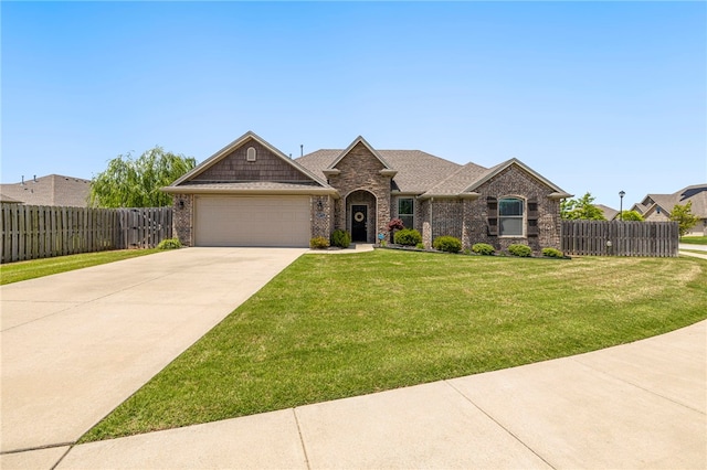 4471 W Oldham Dr, Fayetteville, AR 72704 - view of front of home with an attached garage, driveway, brick siding, and roof with shingles