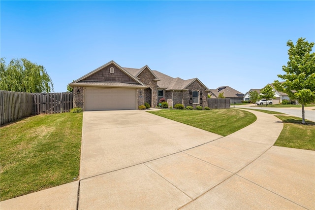 4471 W Oldham Dr, Fayetteville, AR 72704 - view of front of house with an attached garage, concrete driveway, and brick siding