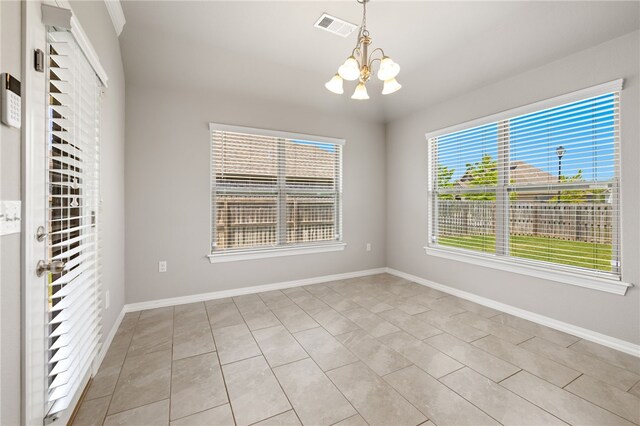 4471 W Oldham Dr, Fayetteville, AR 72704 - unfurnished room featuring a chandelier and baseboards