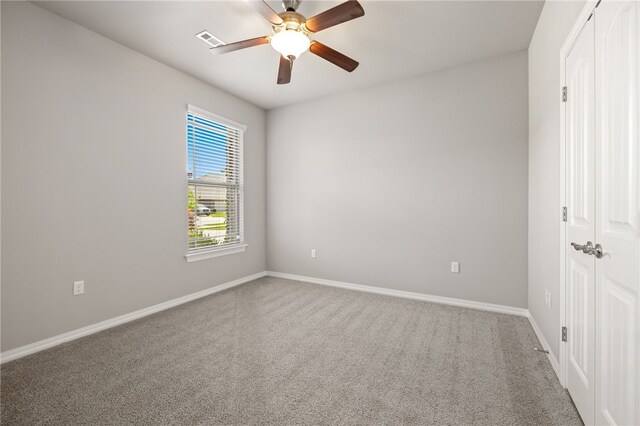 4471 W Oldham Dr, Fayetteville, AR 72704 - unfurnished bedroom featuring carpet flooring, baseboards, and a closet