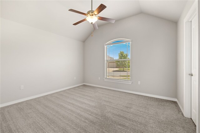 4471 W Oldham Dr, Fayetteville, AR 72704 - unfurnished room with lofted ceiling, carpet flooring, ceiling fan, and baseboards
