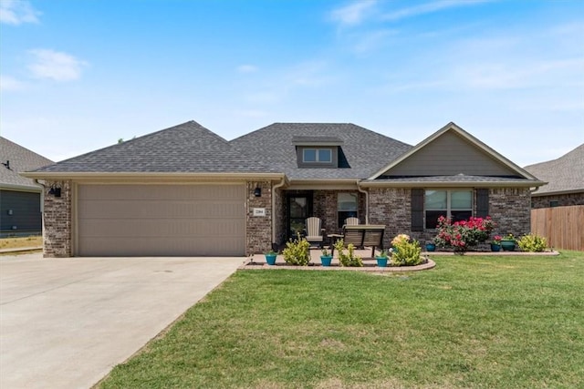 2204 N Kathryn Ln, Siloam Springs, AR 72761 - view of front of property with brick siding, an attached garage, concrete driveway, and roof with shingles
