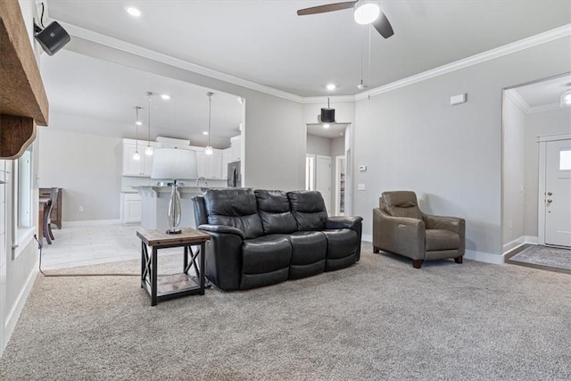 2204 N Kathryn Ln, Siloam Springs, AR 72761 - living area featuring light colored carpet, a ceiling fan, crown molding, baseboards, and recessed lighting