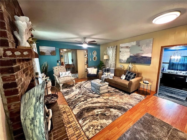 134 E Sherwood Dr, Lead Hill, AR 72644 - living room with wood finished floors and ceiling fan