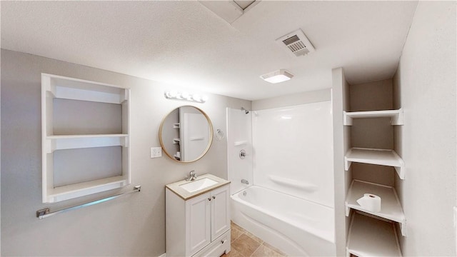 1230 W Mount Comfort Rd, Fayetteville, AR 72703 - bathroom with vanity, bathtub / shower combination, and a textured ceiling