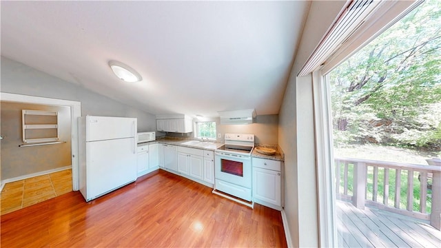 1230 W Mount Comfort Rd, Fayetteville, AR 72703 - kitchen featuring white appliances, lofted ceiling, white cabinets, a sink, and light wood-type flooring