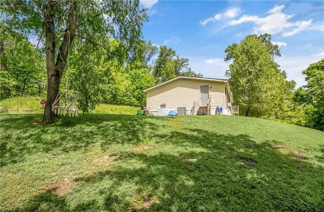 14650 Mariano Rd, Bentonville, AR 72712 - view of grassy yard featuring entry steps