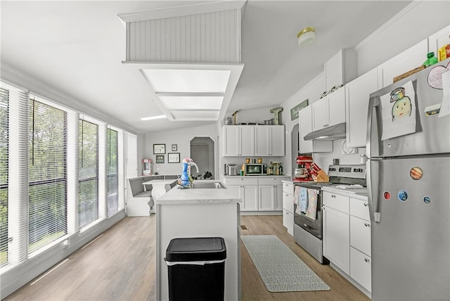 14650 Mariano Rd, Bentonville, AR 72712 - kitchen featuring stainless steel appliances, a sink, under cabinet range hood, light countertops, and a center island with sink
