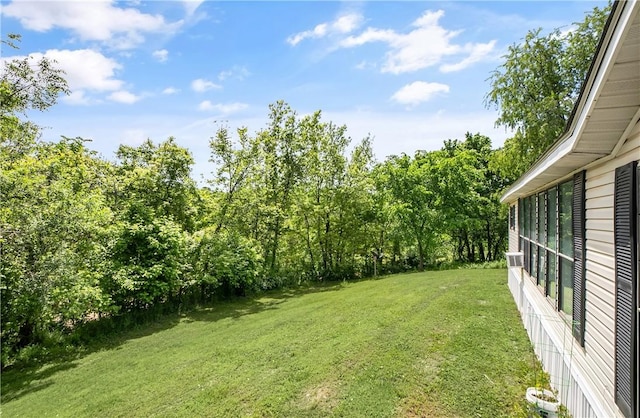 14650 Mariano Rd, Bentonville, AR 72712 - view of green lawn with a view of trees
