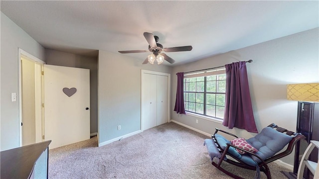 12526 Avoca Hollow Rd, Garfield, AR 72732 - sitting room with ceiling fan, carpet floors, and baseboards