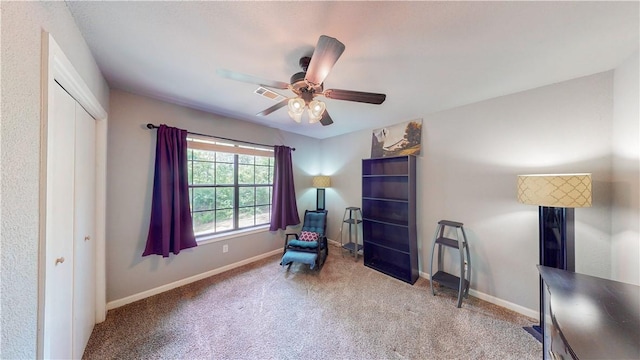 12526 Avoca Hollow Rd, Garfield, AR 72732 - living area with carpet flooring, ceiling fan, and baseboards