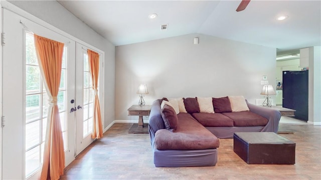 12526 Avoca Hollow Rd, Garfield, AR 72732 - living room with french doors, vaulted ceiling, light wood-style floors, baseboards, and recessed lighting