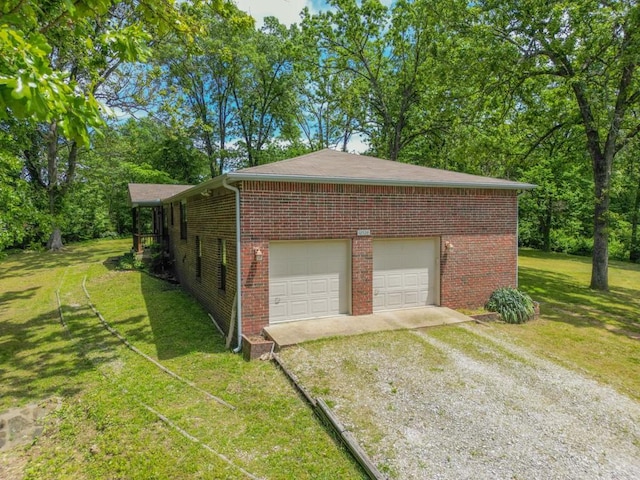 12526 Avoca Hollow Rd, Garfield, AR 72732 - garage with gravel driveway