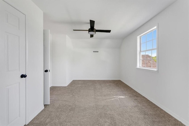 12391 Shamrock Rd, Farmington, AR 72730 - carpeted empty room featuring a ceiling fan, baseboards, and vaulted ceiling