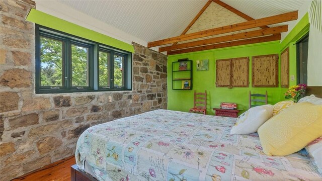 bedroom featuring wood finished floors